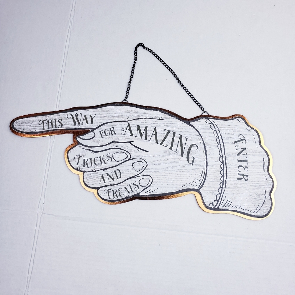 Halloween sign hand tricks & treats
